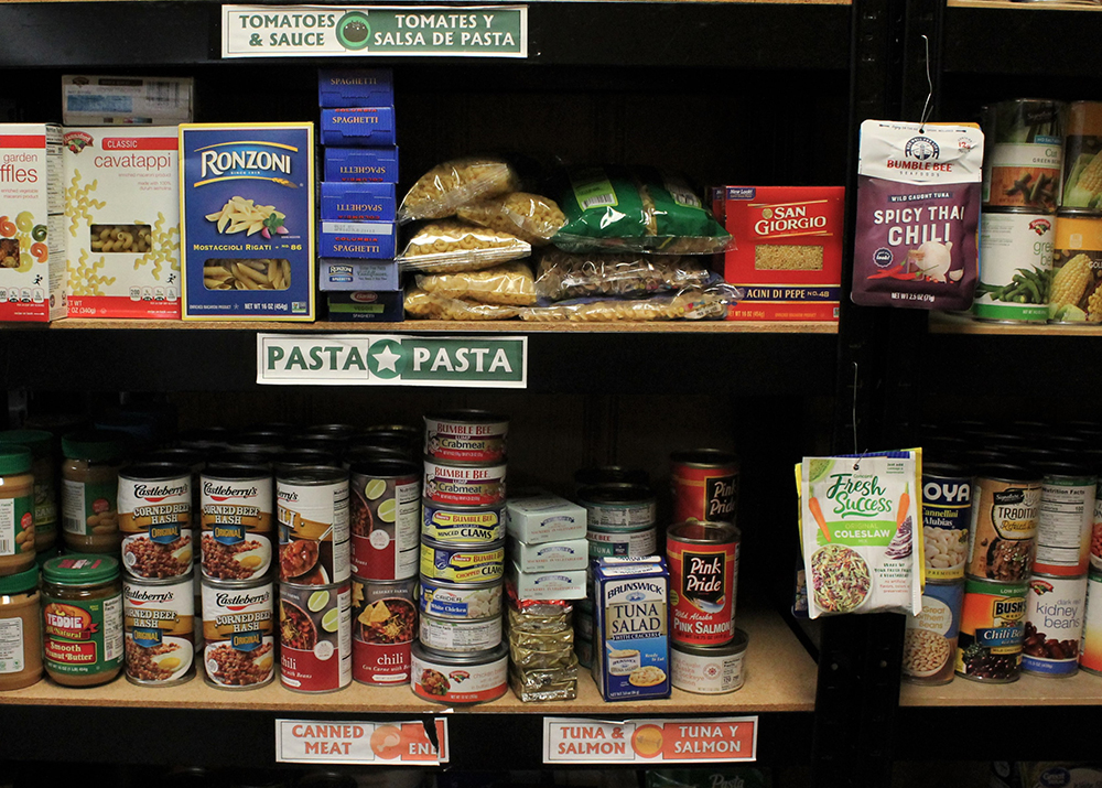 shelves full of packaged foods for food bank