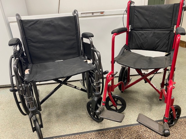 two push wheelchairs in different sizes